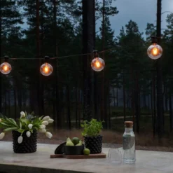 Konstsmide tillægslyskæde E27, 10 ravfarvede LED, sort