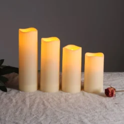 4-pak LED udendørs bloklys, Ø5,5cm, højde 10/13/15/17cm, inkl. fjernbetjening